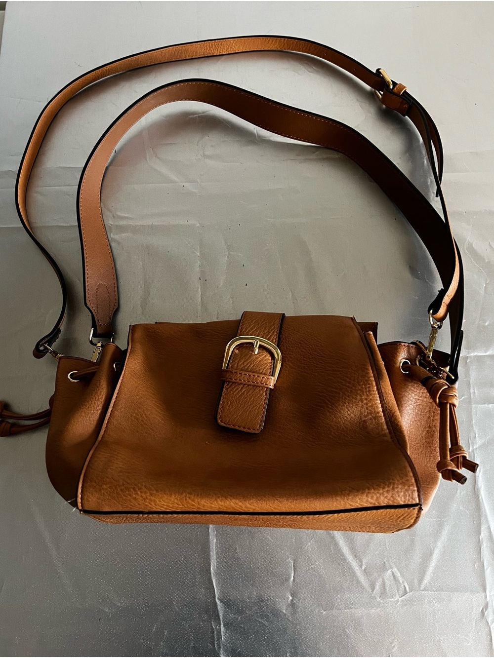 Versatile Brown Leather Shoulder Bag with Buckle Accent